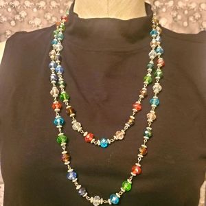 Long colorful necklace of colored beads